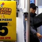 Australia's Domino's Pizza plummets on withdrawing annual outlook, rating downgrades