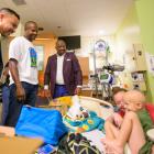 Pro Football Hall of Famer and UGA Alum Champ Bailey visits patients at the Aflac Cancer and Blood Disorders Center of Children's Healthcare of Atlanta