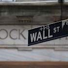 Wall St muted at open as US-China trade talks in focus