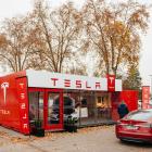 Baird Lowers Tesla (TSLA) to Hold, Citing Valuation and Robotaxi Risk
