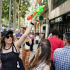 Spaniards turn water guns on visitors in Barcelona and Mallorca to protest mass tourism