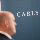 Carlyle Deal Sales Buoy Profits But Shrink Firm’s Assets