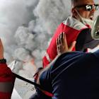 Iran's president visits site of port blast that killed 28