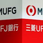 Japan's MUFG posts record annual profit despite 41% slump in Q4
