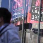 Stock market today: Asian shares mostly decline after Nasdaq sets a record ahead of Fed meeting