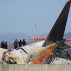 US and Boeing investigators examine the site of a deadly South Korean plane crash