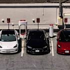Top Stock Movers Now: Tesla, AutoZone, Newmont, and More