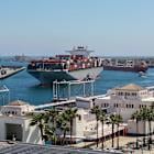 President Trump's China Tariff Cuts Revive Shipping Sector, But Uncertainty Remains