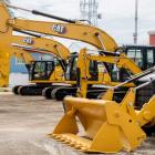 Dow Jones Leader Caterpillar Eyes Buy Point Ahead Of Earnings