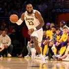 James triple-double helps Lakers hold off Kings, Clippers down Nuggets