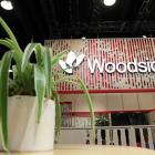 Woodside says Santos merger talks still at early stage as it forecasts higher production