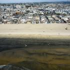 US officials want ships to anchor farther from California undersea pipelines, citing 2021 oil spill