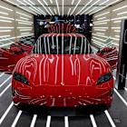 Porsche cuts full-year sales outlook