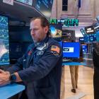 Dow closes higher as stocks notch another weekly gain