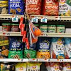 Snacking takes a hit as consumer spending shifts to food staples