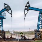 Oil prices slide as OPEC lowers demand growth forecast