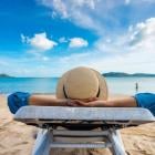 50-Year-Old Earning $12,100 a Month in Dividends Shares His Top 13 Stocks – 'I'm Sitting on a Beach in Thailand Feeling Like I'm Still 30'