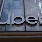Uber targets commuters with cheaper pooled rides, price-lock pass
