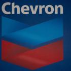 Chevron hit with downgrade after Q2 miss, Hess deal setback