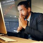 These 2 Nasdaq-100 Stocks Are Down Around 50% This Year