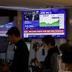 S&P 500, Nasdaq hit record highs on renewed AI bets, rate-cut hope