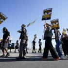 Starbucks union vows further action as baristas return to work