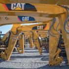 CAT Adds $2B Value Despite Tariffs, Manufacturing Slump: Buy or Sell?