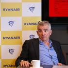 Ryanair profits nearly halved as the low-cost airline blames its ‘frugal’ customers for booking too many last-minute tickets