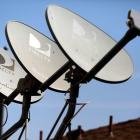 DirecTV agrees to buy Dish for $1