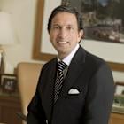 Capri CEO John Idol’s Pay Slips to $9.1 Million