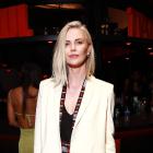 Charlize Theron Suits Up to Take in Jake Paul vs. Mike Tyson