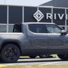 Rivian gains on reported conditional settlement with Tesla