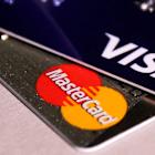 Visa, Mastercard, AmEx fall; Whirlpool upgrade: Trending Tickers