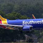 Southwest ditches open seating, Delta recovers from outages