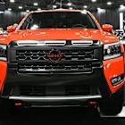 Japanese carmakers slash profit outlooks as they face down U.S. tariffs and Chinese EVs