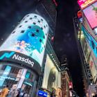 Nasdaq 100 Index Rallies to Record High on Speculation of Earlier Interest Rate Cuts