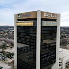 Despite quarterly loss and battered stock, Triumph Financial stays aggressive