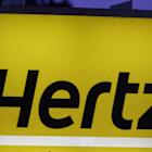 Charles Schwab & American Express earnings, Hertz stock jumps