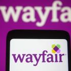 Wayfair downgraded to Hold from Buy