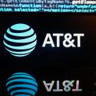 AT&T adds more subscribers than expected, stock pops