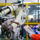 Cranky the robot and shorter work weeks: What manufacturers see as the value of AI