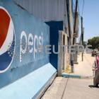 Exclusive-In West Bank, Pepsi and Coke bottlers face can and sugar shortage