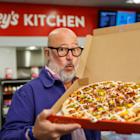 Casey’s Teams up With Food Network Chef Andrew Zimmern to Bring Back Its BBQ Brisket Pizza
