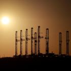 Oil prices waver as Libya restarts output, supply concerns ease